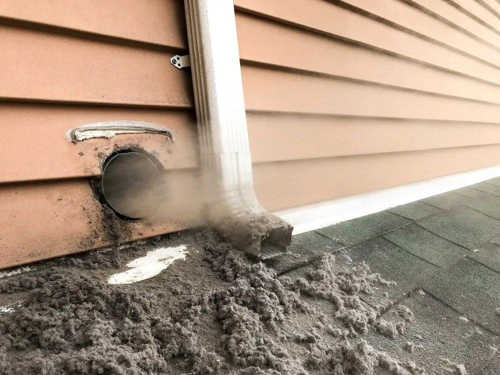 Blowing out a dryer vent in broomfield